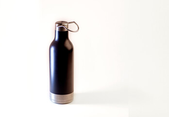 Black-matte water bottle zero waste on white background isolated 