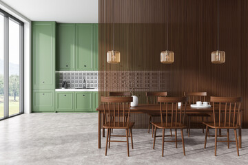 Front view on bright kitchen room interior with dining table