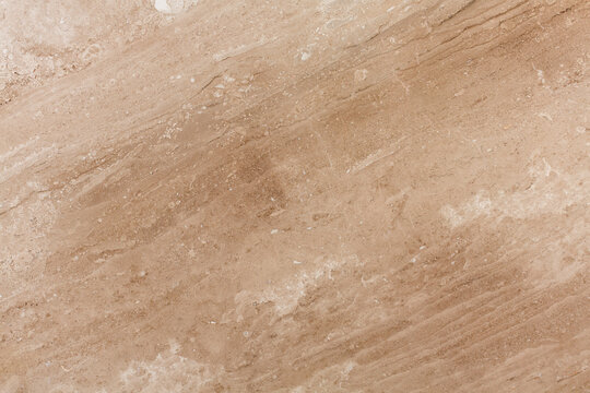 Daino reale natural marble stone texture. Extra soft beige natural marble stone texture, photo of slab. Glossy beige granite pattern. Italian stone texture for ceramic wall and floor tiles closeup.