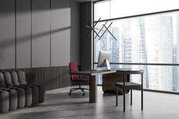 Dark business interior with desk and pc computer, panoramic window