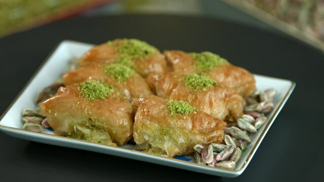 Traditional turkish baklava pistachio pastry. Dilberdudagi, ozel kesim baklava, cikolatali baklava, fistikli baklava, katmer, fistikli kadayif, kattafi, fistik sarma, soguk baklava, midye baklava, cev