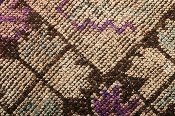 Textures and patterns in color from woven carpets