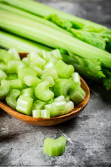 Cut into small pieces of celery in a plate. 
