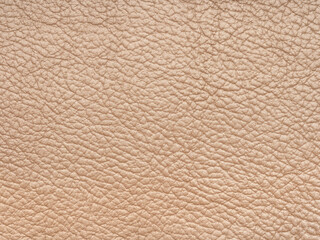 Beige or light brown color leather skin natural with design lines pattern or abstract background. Can use as wallpaper or backdrop luxury event. Genuine leather texture. Faux eco leather.