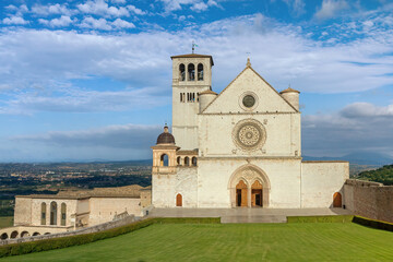 Front view of the Basilica of St.Francis in Assisi at sunny day. Umbria. Italy