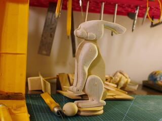 Fototapeta na wymiar making, bunny wooden toy, demonstration on the desktop