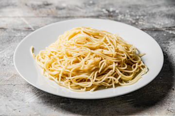 Boiled spaghetti on a plate. 