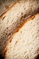 Pieces of wheat bread. Macro background. 