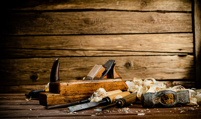 Hand planer with wooden sawdust. 