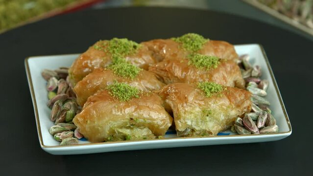 Traditional turkish baklava pistachio pastry. Dilberdudagi, ozel kesim baklava, cikolatali baklava, fistikli baklava, katmer, fistikli kadayif, kattafi, fistik sarma, soguk baklava, midye baklava, cev