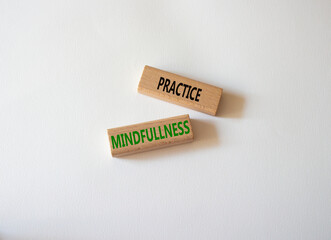 Practice Mindfullness symbol. Concept words Practice Mindfullness on wooden blocks. Beautiful white background. Medical and Psychology and Practice Mindfullness concept. Copy space.