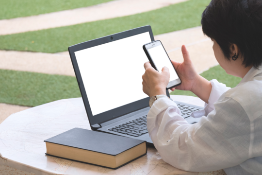 Woman using smartphone with laptop computer in front yard area at home, Transparent screen for your advertising text message or business content, png file