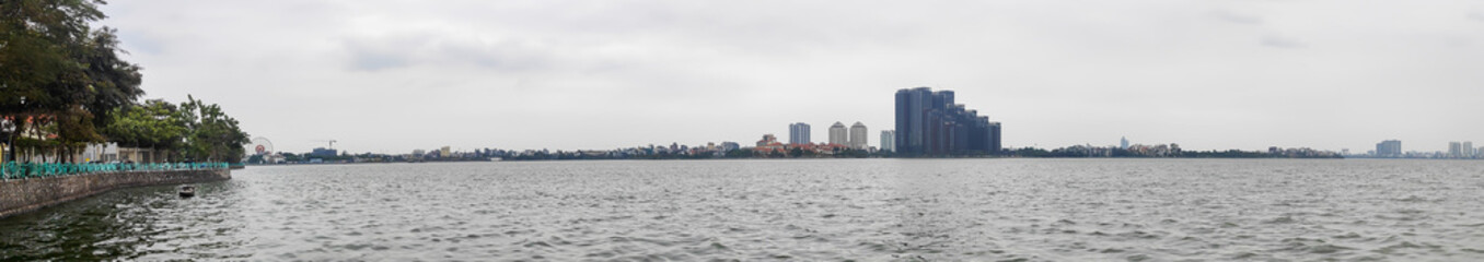 Fototapeta na wymiar Extensive panoramic view of Hanoi skyline and Ho Tay lake. Vietnam