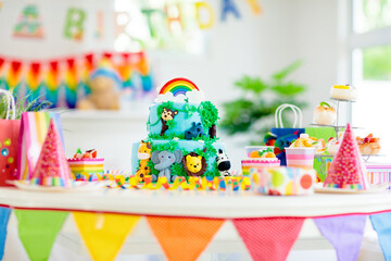 Kids birthday cake. Child jungle theme party.