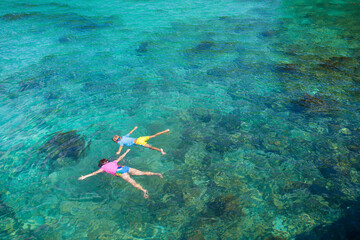 Kids snorkel. Children snorkeling in tropical sea.