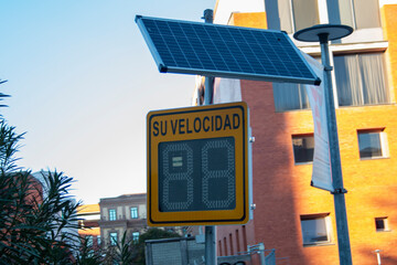 Traffic sign, speed radar, with solar panel for power supply, in the city of Madrid