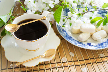 Cup of coffee in the morning, romantic white and blue colors