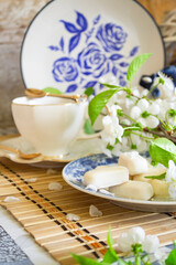 Breakfast in romantic style - mother's day tray with food and flowers