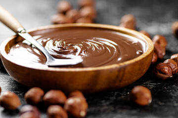 Hazelnut butter in a plate with a spoon. 
