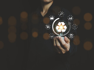 Businessman with recycling of environmental technology used in the organization with sustainable development to promote clean energy Green business from renewable energy