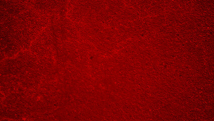 Red concrete textured wall background. Red cement wall texture for interior design. dark red edges. copy space for add text.