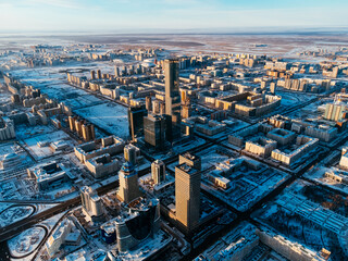 Fototapeta na wymiar Aerial drone view Nur-Sultan, Kazakhstan Qazaqstan city center with skyscrapers and Baiterek Tower