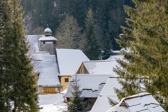 Snow time in Slovak village Zuberec. Traditional Slovakian wooden houses in Open Air Museum of ancestry village.