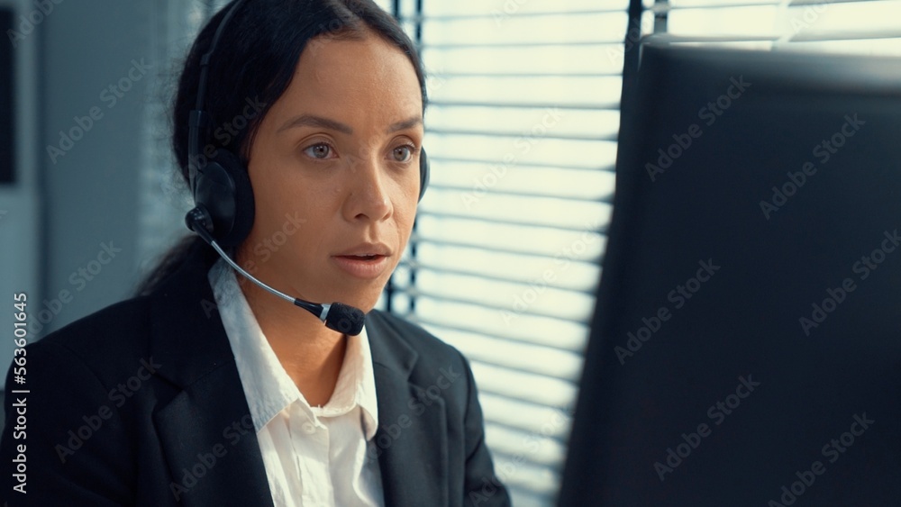 Aufkleber competent female operator working on computer and talking with clients. concept relevant to both cal