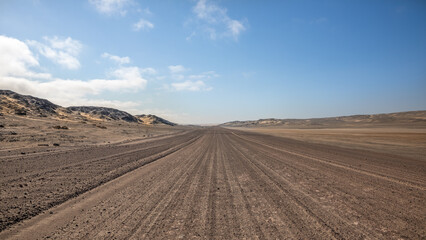 Gravel road in Skeleton Coast Park, Namibia.	