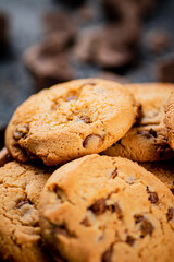 Homemade cookies with chocolate. Against a dark background