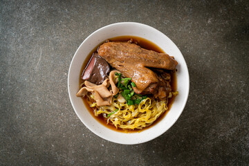 egg noodles with stewed and braised duck in brown soup