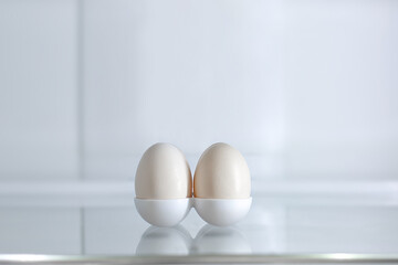 chicken eggs in the refrigerator. Empty shelves in the refrigerator. food shortage. Funds for the...