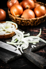 Chopped onions on a cutting board. 