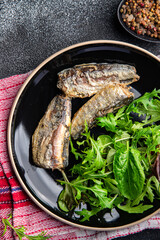 sardine salad green mix lettuce leaves healthy meal food snack on the table copy space food background rustic top view