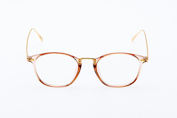 Fashion sunglasses light brown frames on white background.