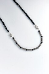 Elegant jewelry set. Jewellery set with gemstones. Jewelry accessories collage. Product still life concept. Ring, necklace and earrings.