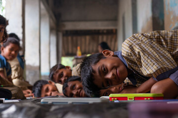 Obraz premium school Students playing while studying in classroom