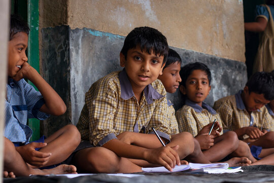 Students having mid day meal at school