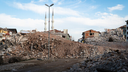 Earthquake damage in a city. Destroyed buildings after an earthquake. Selective focus included