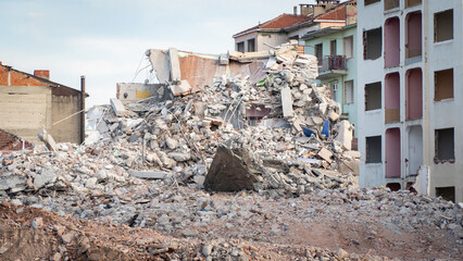 Earthquake damage in a city. Destroyed buildings after an earthquake. Selective focus included
