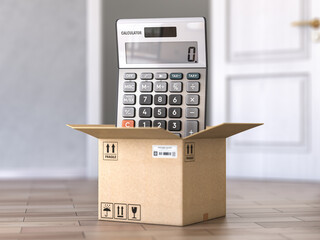 Calculating of delivery and shipping costs concept.Calculator and cardboard box in front of open door.