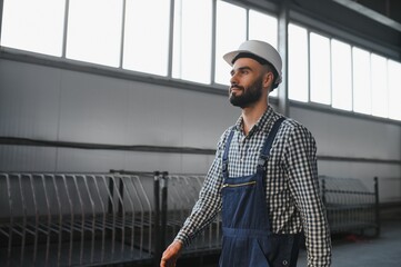 Warehouse worker. Guy in warehouse worker uniform.