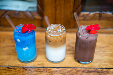 delicious milkshakes on the bar counter in a glass jar with a straw.