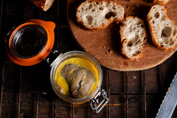 jar of foie gras and French baguette wedges. Preparing canapes. - obrazy, fototapety, plakaty