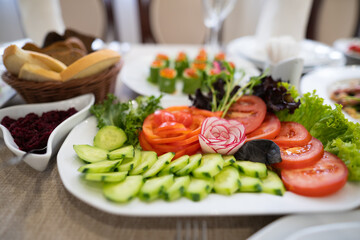 tasty healthy cut on the festive table from vegetables.