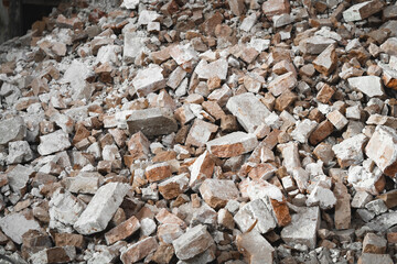 old broken red brick, destroyed wall of the building