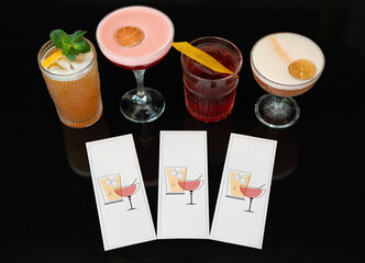 beautiful and delicious alcoholic cocktails prepared at the bar by the bartender.