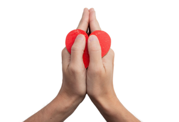 palms folded in prayer with the heart 