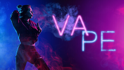 Vape woman. Girl and smoke in neon light. Models use electronic cigarette. Hipster woman holding...