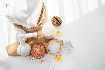 Obraz na płótnie Canvas Spa accessory composition set in day spa hotel , beauty wellness center . Spa product are placed in luxury spa resort room , ready for massage therapy from professional service .